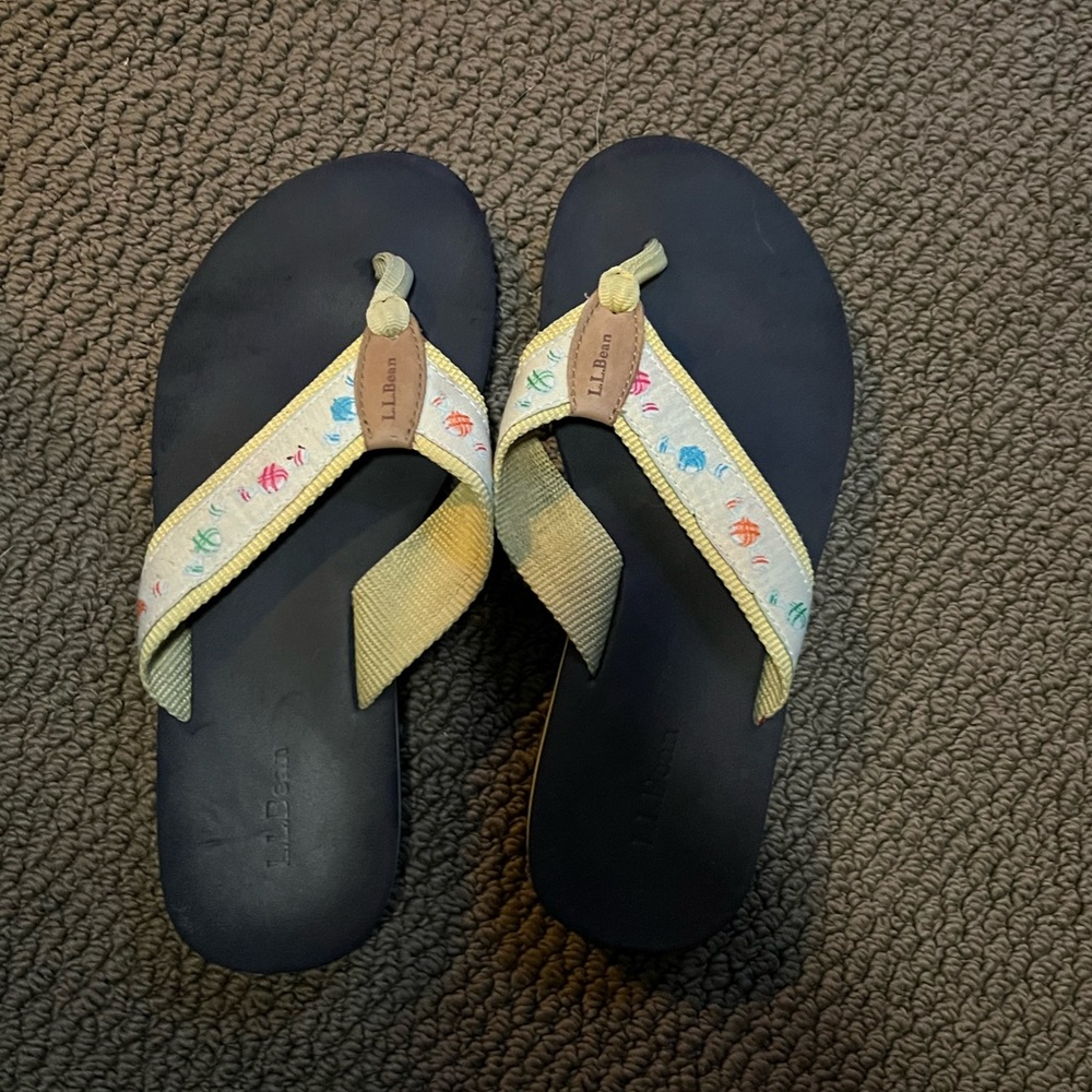 Vibrant Flip Flops With Patterned Straps - image 2